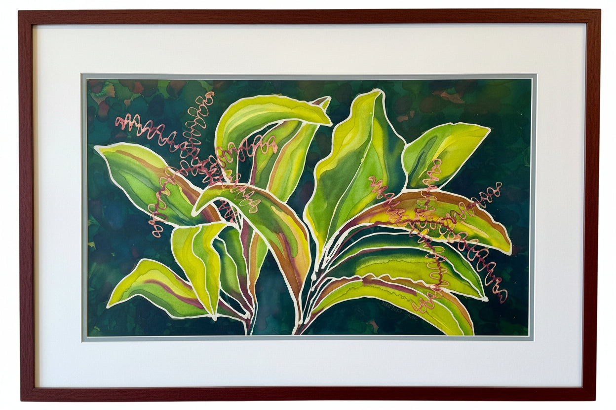 Framed artwork of Hawaiian ti leaves on a dark background