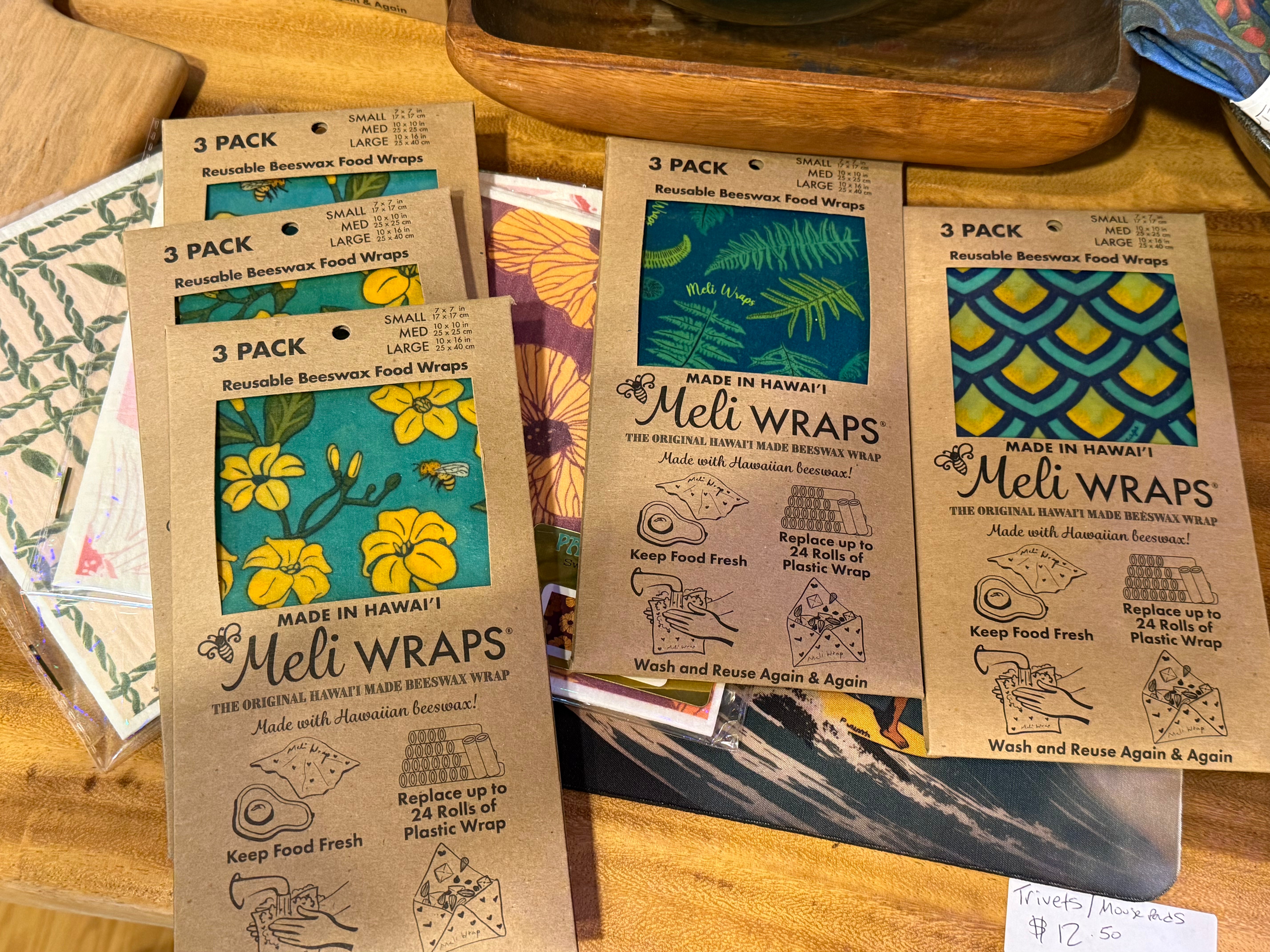Packages of Meli Wraps on a wooden surface